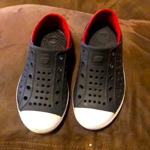 Black and red Skechers